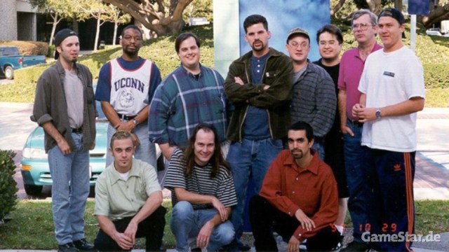 Tim is in a red shirt, bottom left.